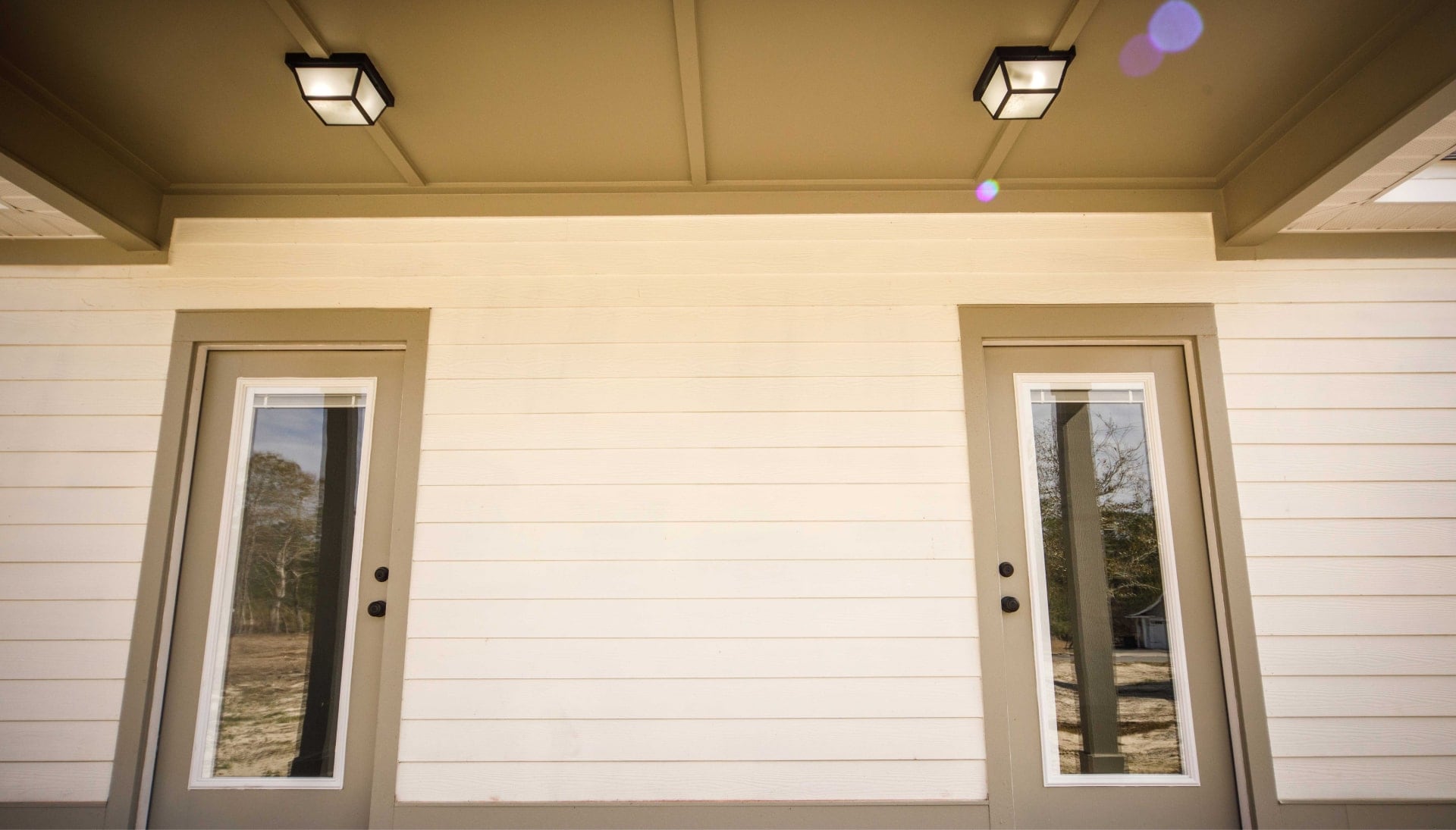 We offer siding services in Rockford, Illinois. Hardie plank siding installation in a front entry way.